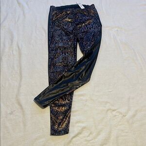 Snakeskin Print Jeggings with white accents.